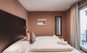 Camera da letto con terrazzo